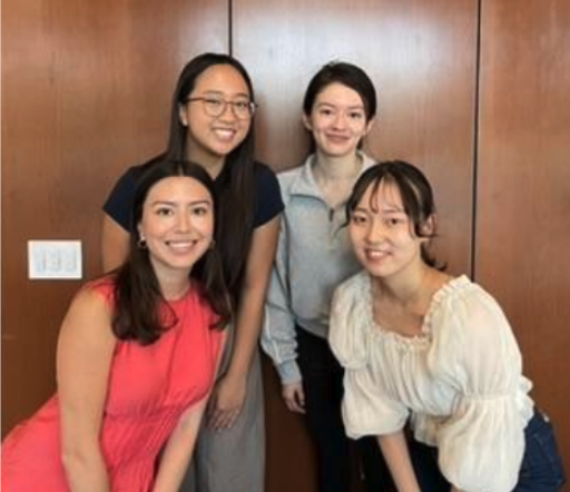 4 people posing for a photo