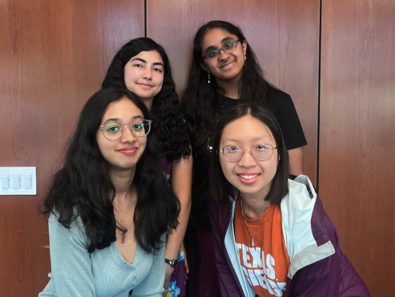 4 people posing for a photo