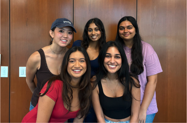 5 people posing for a picture